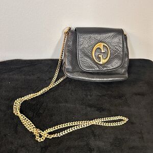 Gucci 1973 Small Chain Shoulder Bag Black Pebbled Leather Gold GG Logo Crossbody